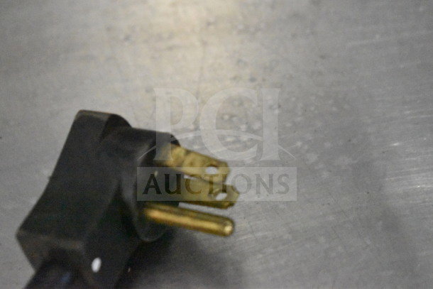 Beverage Air WTRF48A-1-SA-A freezer power plug on metal surface, showing 115V, 1 Phase compatibility.