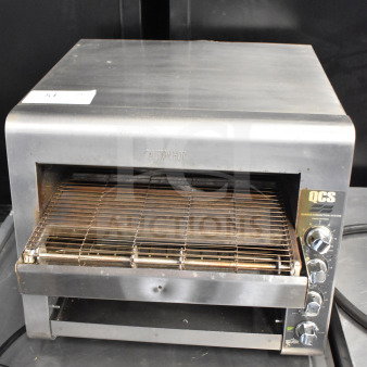 Star Holman QCS-5-55HC Commercial Conveyor Toaster Oven, 240V, 1 Phase, shows signs of use. Front controls and caution tag visible.