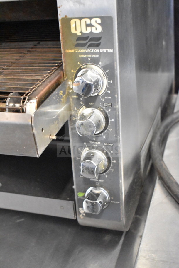 Star Holman QCS-5-55HC conveyor toaster oven, 240V, 1 Phase. Features control knobs and labels. Used condition.