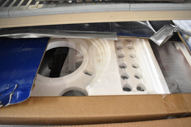 GE JVM3160RTSS Over the Range Microwave Oven in original box, new condition, visible protective packaging and inserts.