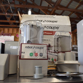 Robot Coupe R2 commercial countertop food processor with blades, box included, in used condition.