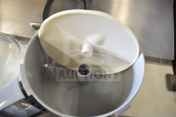 Robot Coupe R2 commercial food processor bowl with lid, showing internal structure, gray and white plastic, clean condition.