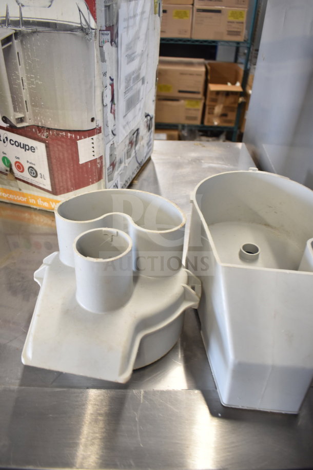 Robot Coupe R2 food processor parts with blades, shown with original packaging. Used condition.