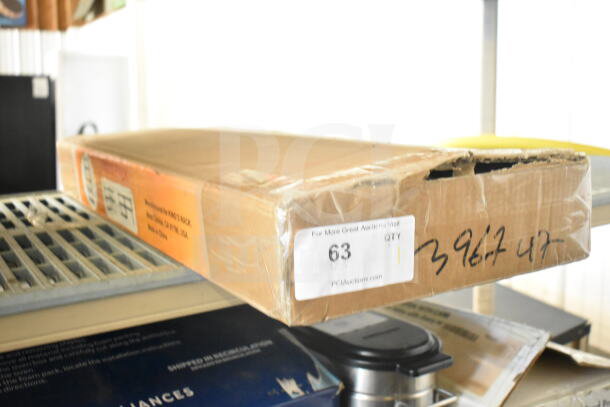 IN ORIGINAL BOX! King's Rack shelving unit, unopened cardboard packaging, manufacturer info and auction label visible.