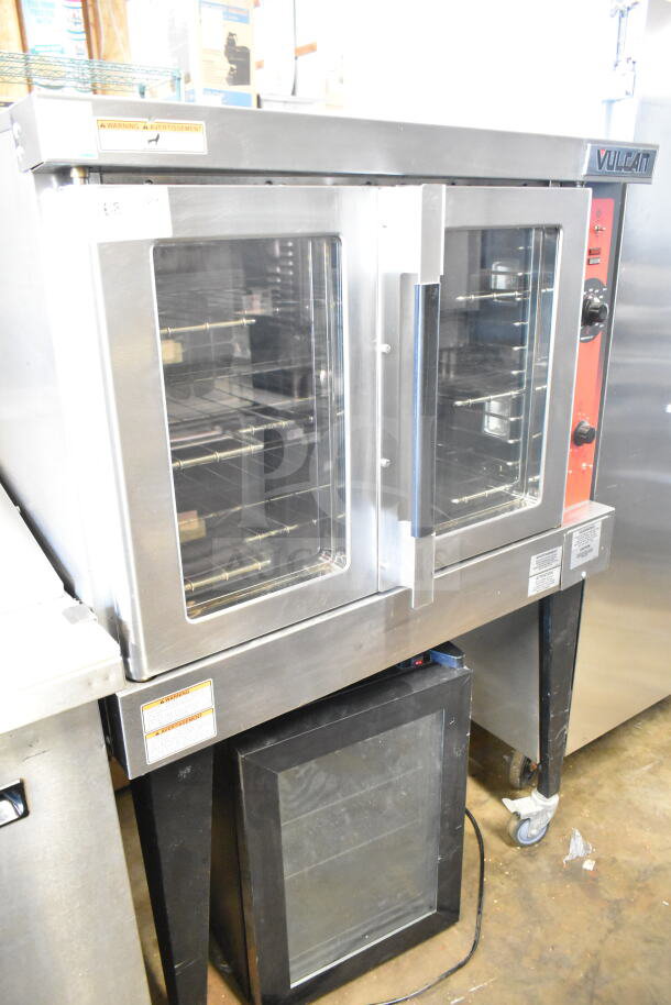 Vulcan commercial convection oven, electric, full-size, view-through doors, thermostatic controls, metal legs, good condition.