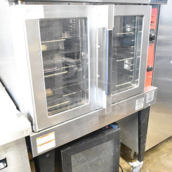 Vulcan commercial convection oven, electric, full-size, view-through doors, thermostatic controls, metal legs, good condition.