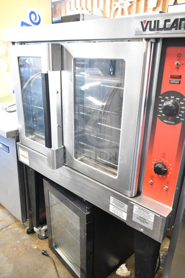 Vulcan commercial electric full-size convection oven with view-through doors, thermostatic controls, metal legs, excellent condition.