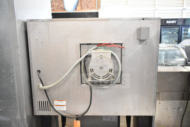 Vulcan commercial electric convection oven, metal exterior, view-through doors, thermostatic controls, sturdy legs, used condition.