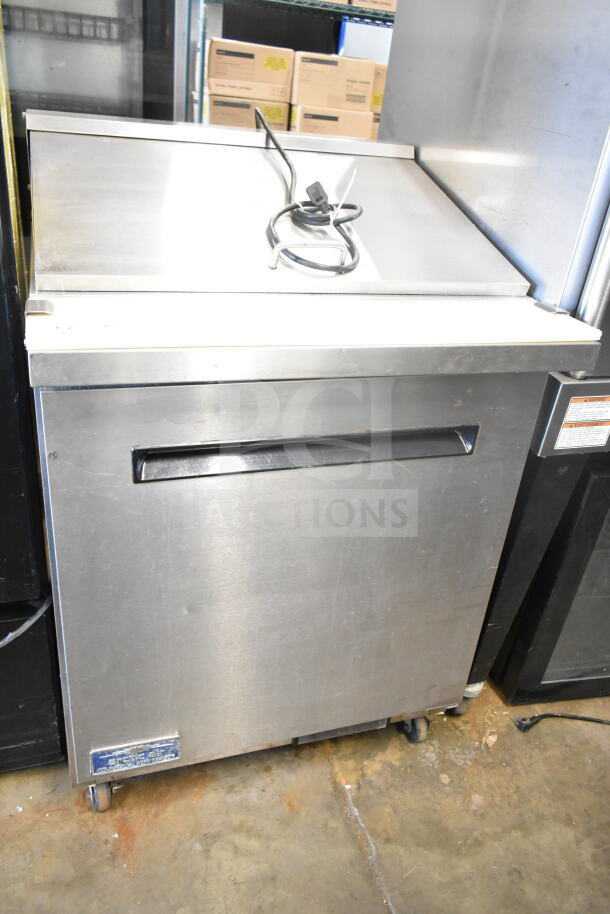 Arctic Air AMT28R commercial sandwich prep table with stainless steel finish and mega top. Features casters and 115V power.