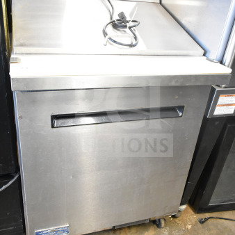 Arctic Air AMT28R commercial sandwich prep table with stainless steel finish and mega top. Features casters and 115V power.