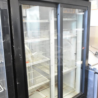 Universal Nolin MC1100S-1 commercial 2 door reach-in cooler merchandiser, 115 volts, 1 phase, Snapple branding on top.