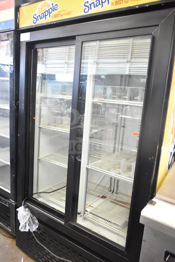 Universal Nolin MC1100S-1 commercial 2-door reach-in cooler merchandiser, 115 volts, 1 phase, with Snapple branding.