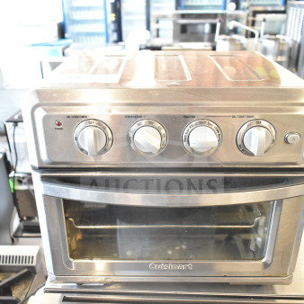 Cuisinart TOA-60 countertop toaster oven air fryer, silver finish, four control knobs, visible branding, clean condition.