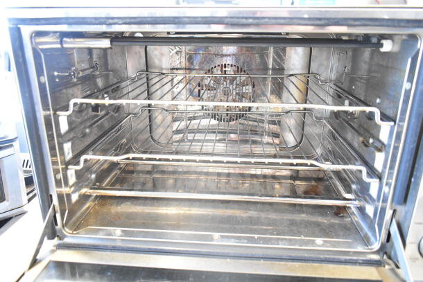 Waring Countertop Toaster Oven Air Fryer, 120 Volts, 1 Phase, visible interior with racks. Appears in used condition.