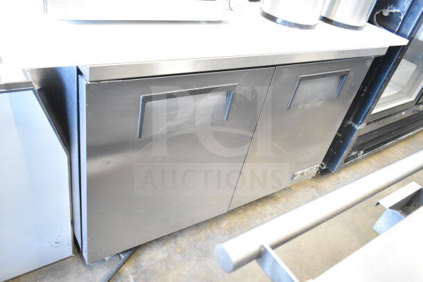 True TUC-48 undercounter cooler, 2-door, on casters, 115V, 1 phase, commercial grade, silver finish, good condition.