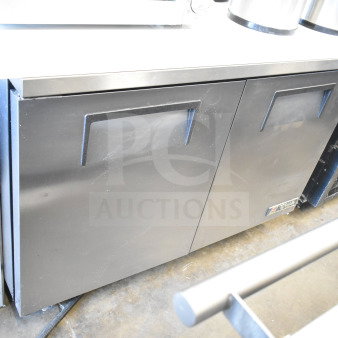 True TUC-48 undercounter cooler, 2-door, on casters, 115V, 1 phase, commercial grade, silver finish, good condition.