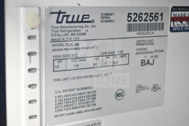 True TUC-48 undercounter cooler label showing model, voltage (115V), refrigerant (R134A), and NSF certification.