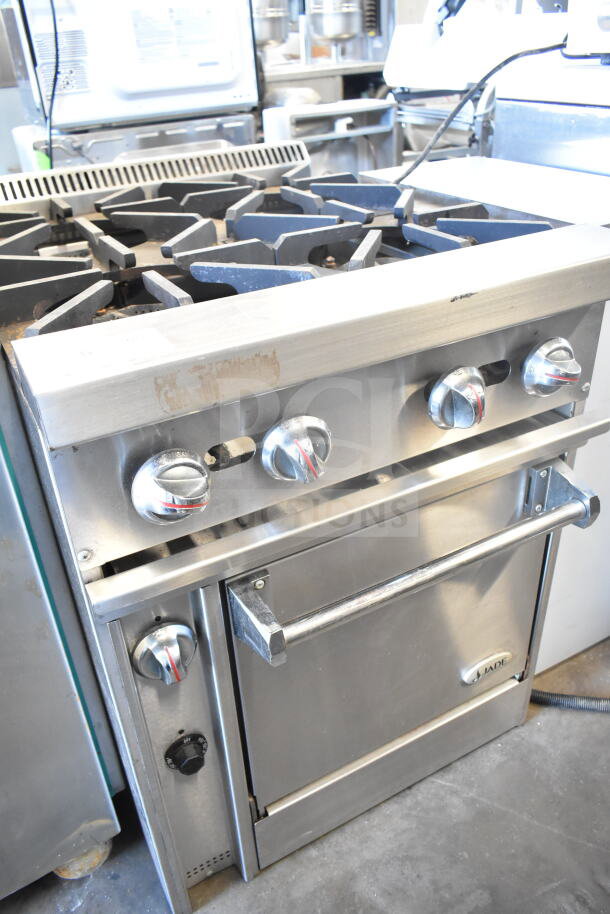 Jade Bistro commercial gas 4-burner range with oven, stainless steel, used condition, visible control knobs and front markings.