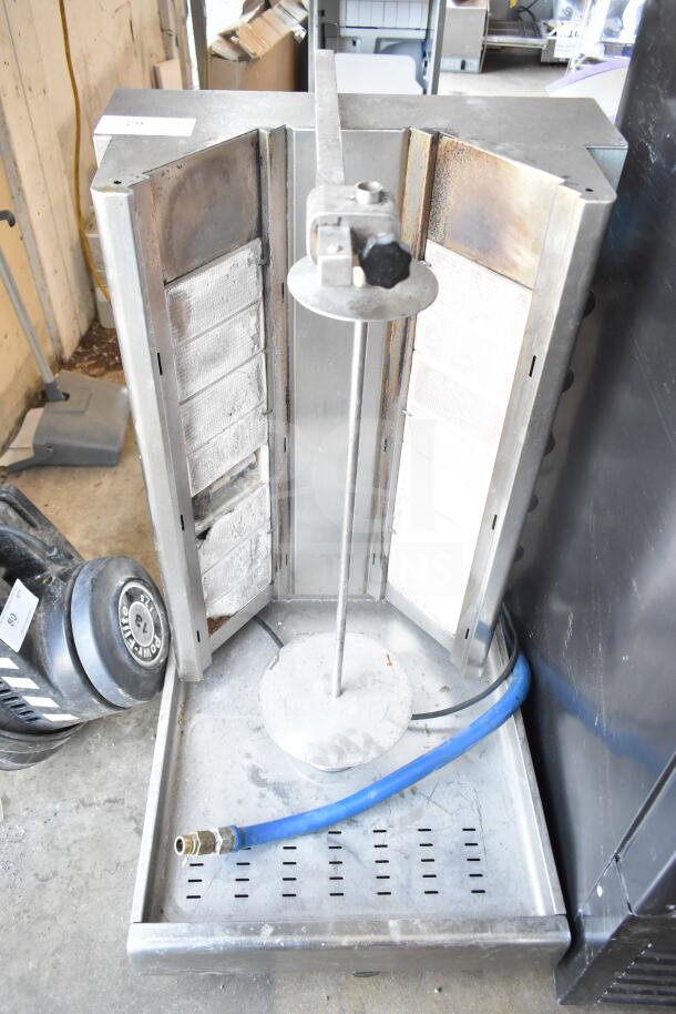 DG16V countertop gyro machine, natural gas powered, vertical rotisserie, good condition, visible blue hose, metal frame.