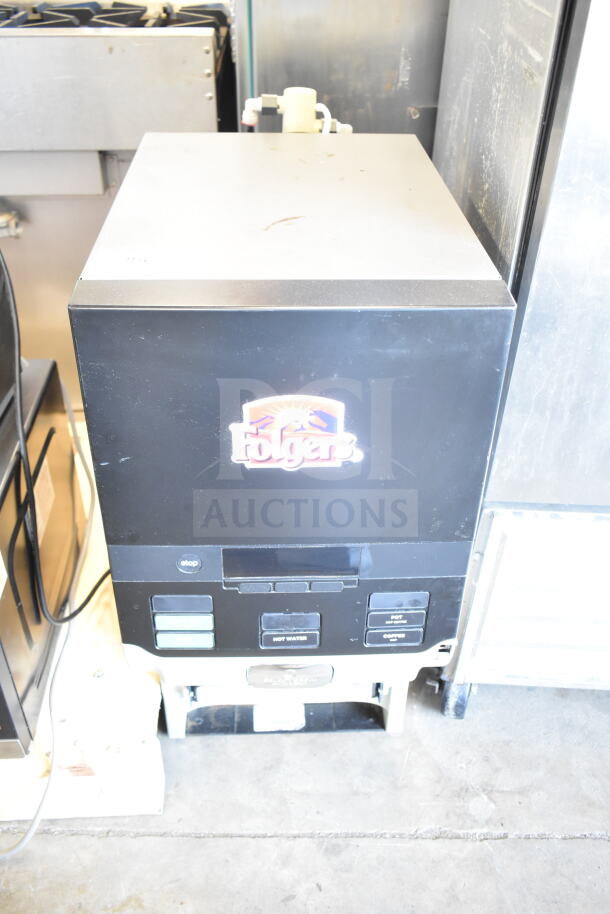 Select Brew NG300B-BLK Specialty Coffee System, 208/240V, black, used condition, buttons for selection and Folgers logo.