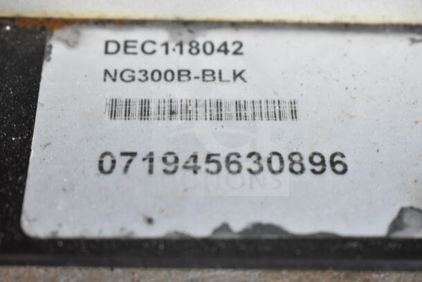 Label on Select Brew NG300B-BLK showing model number, barcode, and serial number, indicating specialty coffee system details.