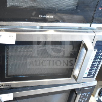 2019 Amana RCS10TS Commercial Countertop Microwave Oven, stainless steel, 120 Volts, 1 Phase, keypad controls, visible tags.