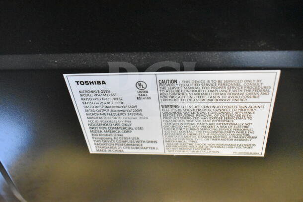 Toshiba WSI-EM22AST commercial countertop microwave oven, 120V, new, model label visible, showcasing specifications.