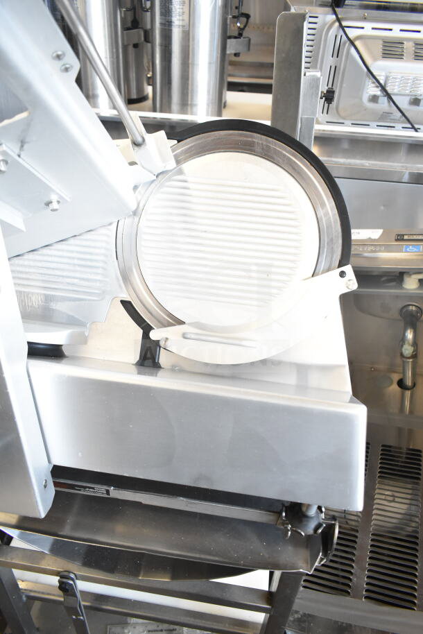 Bizerba GSP V Commercial Meat Slicer on stand, 120V, 1 Phase. Features adjustable blade, stainless steel build, excellent condition.