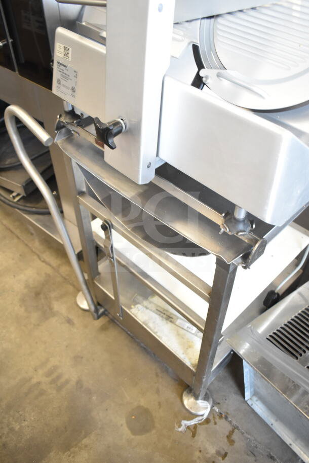 Bizerba GSP V meat slicer on equipment stand, 120 volts, 1 phase, excellent condition, visible control knobs and power label.