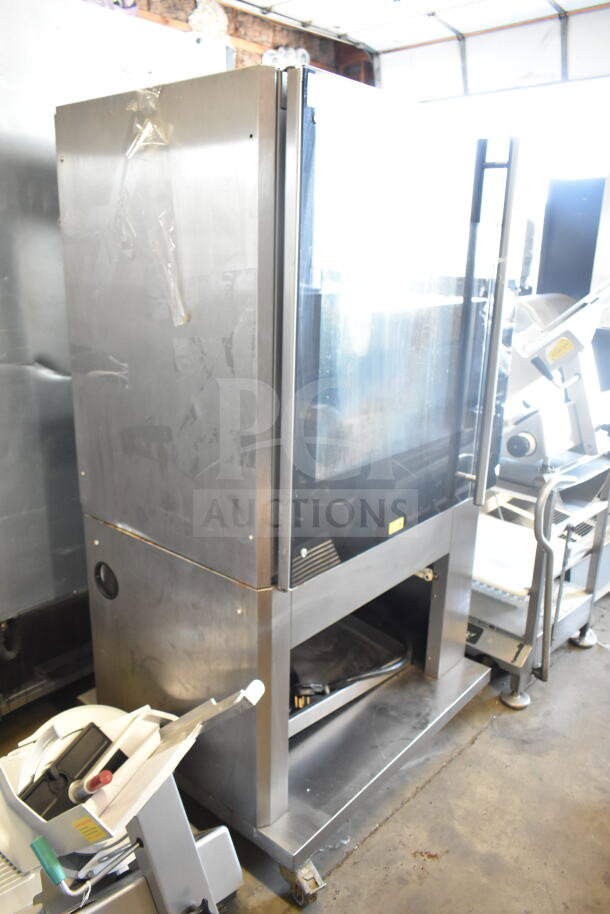Fri-jado TDR 7-P stainless steel commercial rotisserie oven, 208V 3-phase, on casters, showing front and side view.