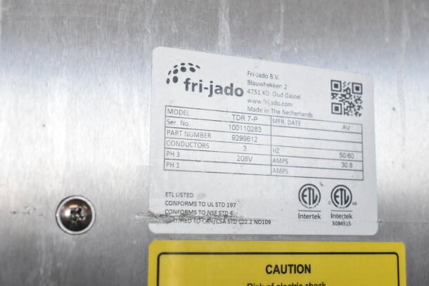 Fri-jado TDR 7-P stainless steel rotisserie oven label, showing model, serial number 100110283, and electrical specs.