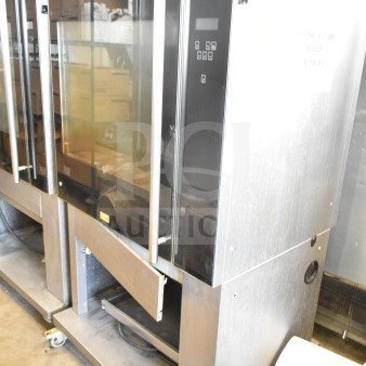 Fri-jado TDR 7-P stainless steel rotisserie oven, electric, 208V, 3 phase, with glass doors, digital controls, on casters.