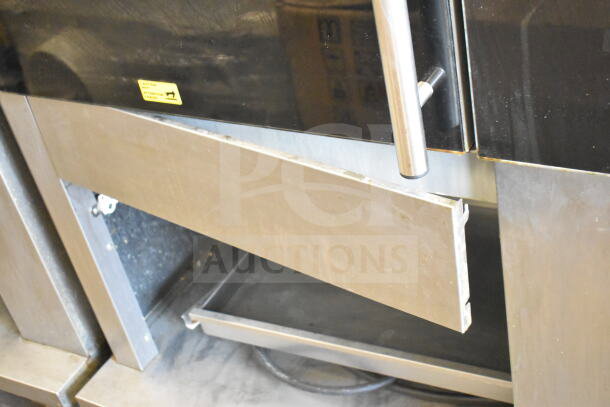 Fri-jado TDR 7-P stainless steel rotisserie oven, commercial floor style, on casters, 208V, 3 phase, good condition.