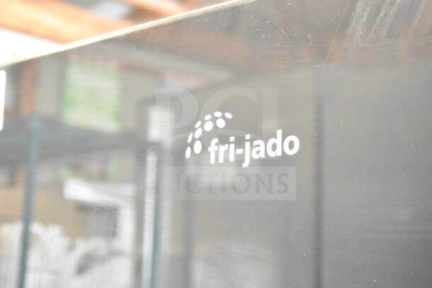 Fri-jado TDR 7-P stainless steel rotisserie oven with commercial casters. Electric powered, 208V, 3-phase. Logo visible.