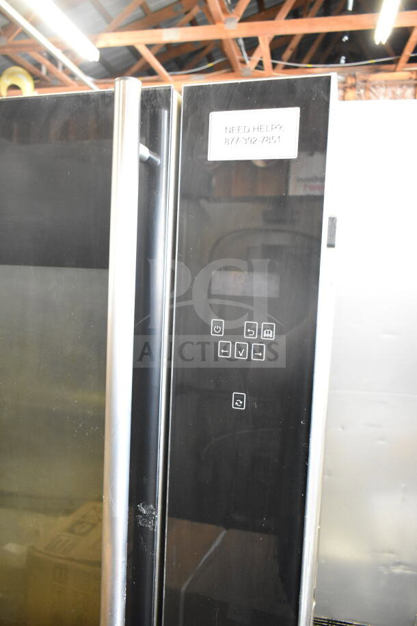 Fri-jado TDR 7-P stainless steel electric rotisserie oven, floor style, with control panel and commercial casters.