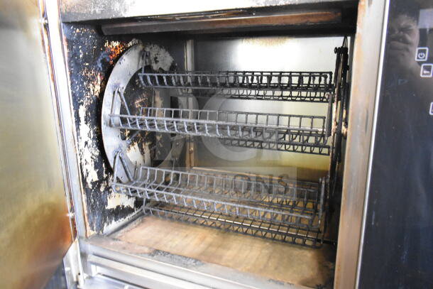 Fri-jado TDR 7-P stainless steel rotisserie oven on casters, electric, 3 phase, 208 volts, interior racks visible.