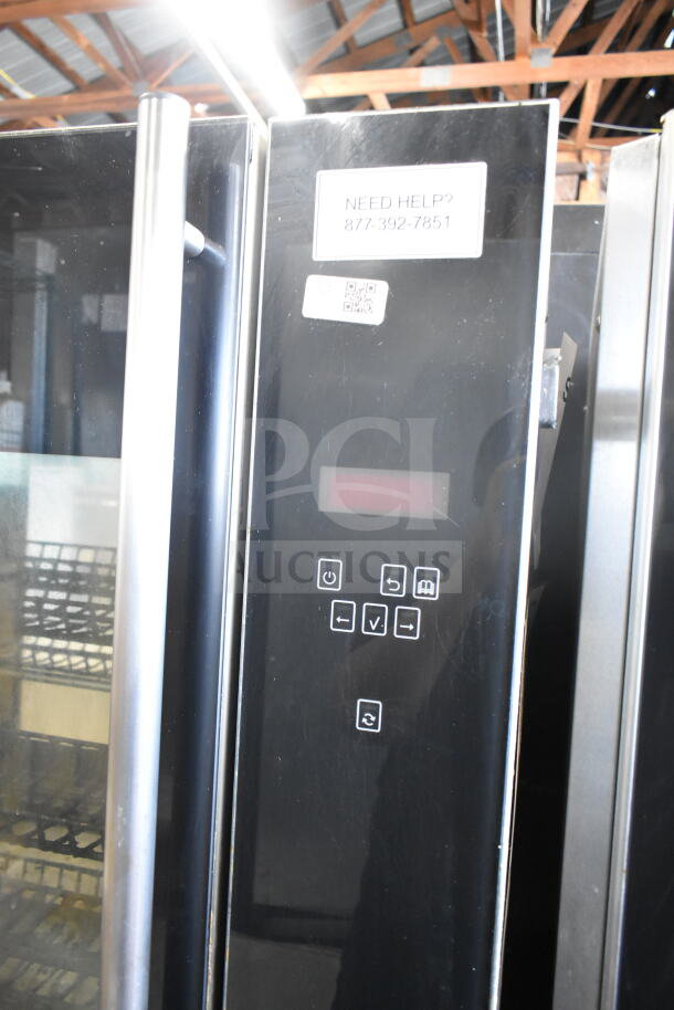 Fri-jado TDR 7-P stainless steel rotisserie oven, electric, 208V 3 phase, with control panel and commercial casters.