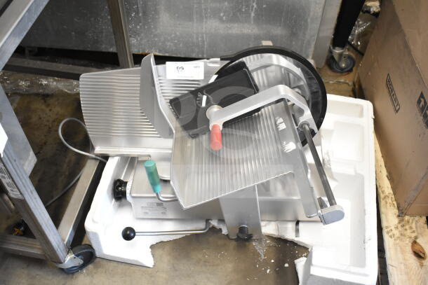 2016 Bizerba GSP H Commercial meat slicer, 120V, 1 phase. Stainless steel, excellent condition, with ergonomic handles.