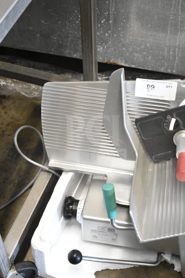 2016 Bizerba GSP H commercial meat slicer, 120V, 1 phase. Features stainless steel blade and ergonomic handles.