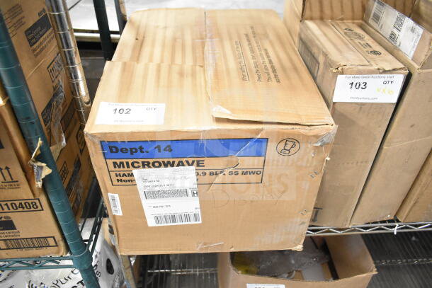 Sealed box of Hamilton Beach 100714402 Countertop Microwave Oven labeled "Microwave Display", in good condition.