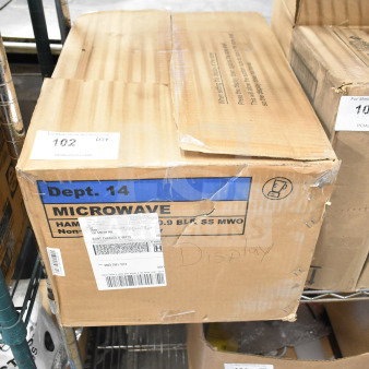 Sealed box of Hamilton Beach 100714402 Countertop Microwave Oven labeled "Microwave Display", in good condition.