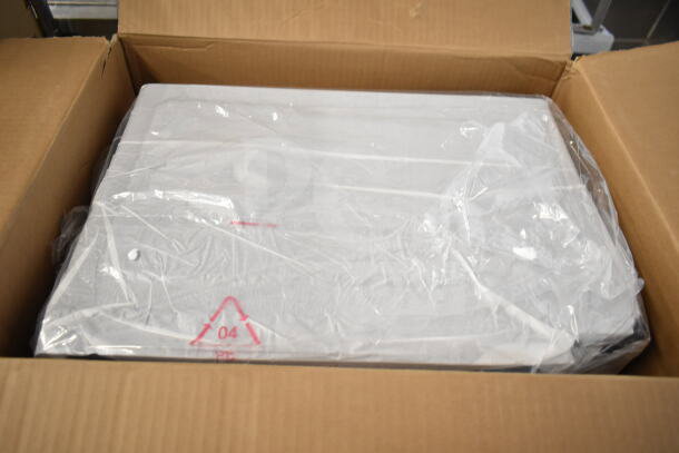 Hamilton Beach 100714402 countertop microwave oven in original packaging, new condition, in opened box.