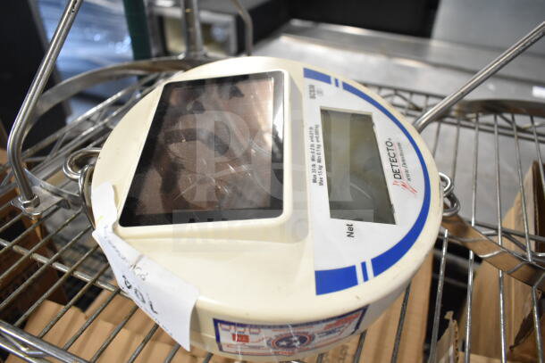 Detecto SCS30 hanging produce scale, with LCD display, dual metal hanging supports; max 30 lb. Some wear visible.