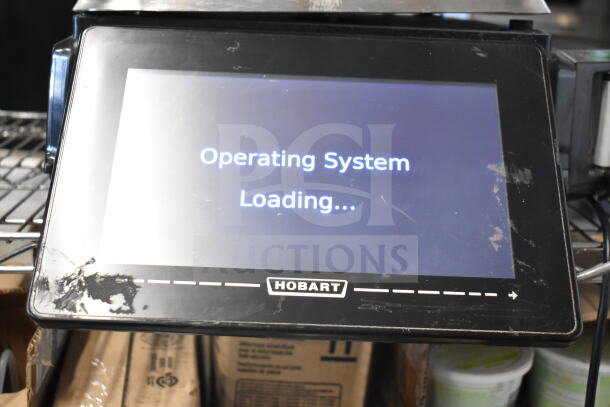 2017 Hobart HTi-7LH26 commercial scale, touchscreen display showing "Operating System Loading." Tested and working.