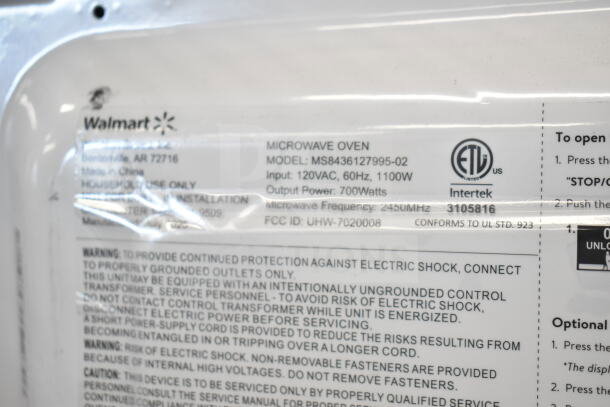 Hamilton Beach MS8436127995-02 microwave, 120V, 1 phase, door issues, 700W output, item label showing model and safety info.