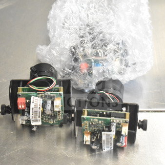 Box of Wren Cameras, showing electronic components and wiring. Items are in bubble wrap, condition appears used. Markings include model number YP1202 and "Made in Italy."