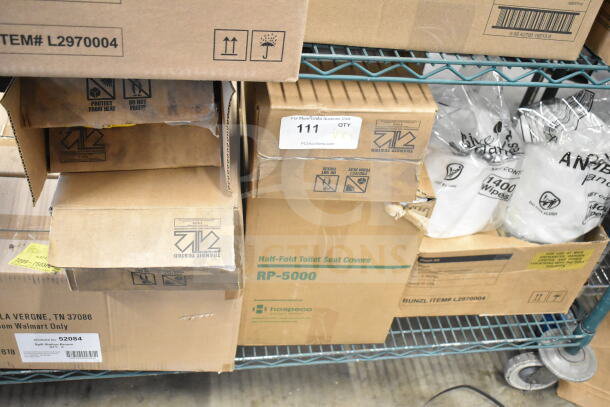 7 brand new scratch and dent items, includes RP-5000 toilet seat covers, Diversey cleaners. Boxes show signs of wear.