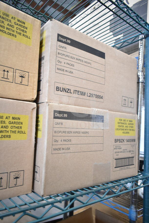 Cardboard boxes of Biopure BZK Wipes, 1400 pieces per box, labeled "Made in USA" and stored on a metal shelf.