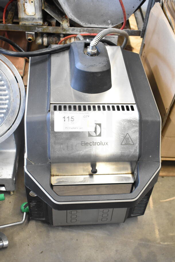 Electrolux HSPP3RPRS commercial countertop panini press, 208V, 1 Phase, with visible branding and condition marks.