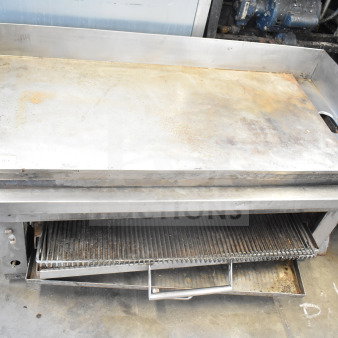 Commercial countertop flat top griddle with cheese melter, stainless steel, used condition, item tag 118 visible.